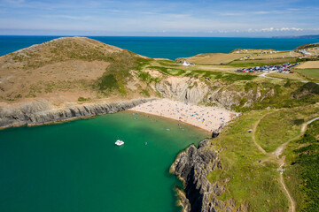 Wall Mural - Aerial view of a busy beach and bay in West Wales (Mwnt, Ceredigion)