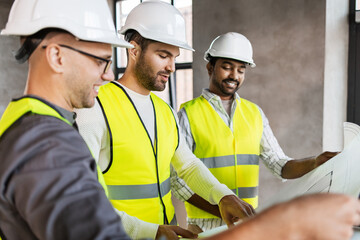 Sticker - architecture, construction business and people concept - male architects in helmets with blueprint working at office