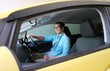 © KrishnaTedjo - Asian man smiling happy while driving his car