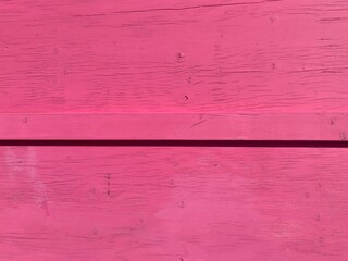 Wall Mural - A wooden wall painted pink 