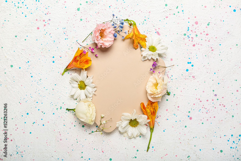 Decorative stand with frame made of beautiful flowers on light background