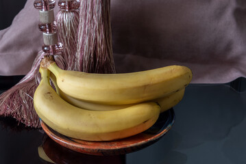 Wall Mural - Ripe yellow bananas on a plate.