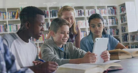 Animation of multiracial students studying with digital tablet in library over pie chart and codes