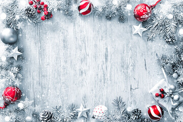 Wall Mural - christmas and new year background with fir branches, gift boxes, ornament and snowfall