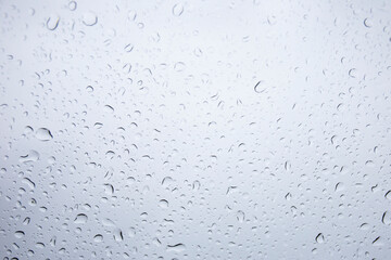 Fototapete - Raindrops on the background glass.