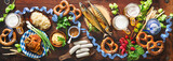 Fototapeta Uliczki - Festive served table with Bavarian specialities. Oktoberfest menu