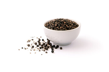 Wall Mural - Black pepper or peppercorns in ceramic bowl isolated on white background.