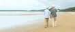 Asian Lifestyle senior couple walking chill on the beach happy in love romantic and relax time after retirement.  People tourism elderly family travel leisure and activity after retirement vacations 