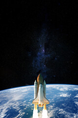 Wall Mural - space shuttle takes off into space. elements of this image furnished by nasa.