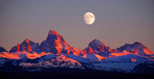Sunset Light Alpen Glow On Tetons Teton Mountains Wtih Moon Rising