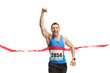 © Ljupco Smokovski - Young man finishing a marathon and gesturing happiness