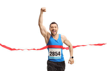 Wall Mural - Young man finishing a marathon and gesturing happiness