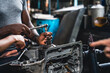 © P Stock - Professional mechanic checking and repair the engine.