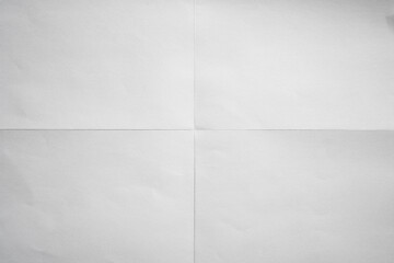 Wall Mural - White paper crisp folded in four fraction background