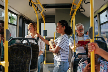 Poster - Student on way to university in public bus