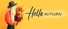 Young Woman With Beautiful Bouquet And Text HELLO AUTUMN On Yellow Background