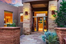 Luxury Home Entrance At Sunset