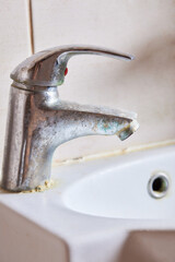 Wall Mural - Rusted faucet, macro shot of rusted faucet. Water scarcity and water consumption concept idea.