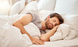 © Nicholas Felix/peopleimages.com - Relax, sleep and peace of a tired man sleeping in a bedroom bed at home. Dreaming, relaxing and resting calm attractive person with closed eyes on a pillow at his house in the morning taking a nap