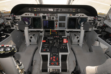 Poster - Modern turboprop airplane cockpit detail interior view