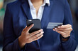 © Wesley J/peopleimages.com - Business woman hands online shopping on phone use ecommerce credit card internet payment. Accounting executive make online store web purchase. Fintech technology for company finance bills or invoice.