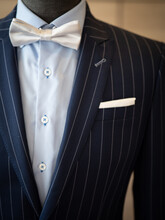 Close Up Of Dark Blue Stripe Jacket Suit With Light Blue Shirt , Handkerchief , Bow