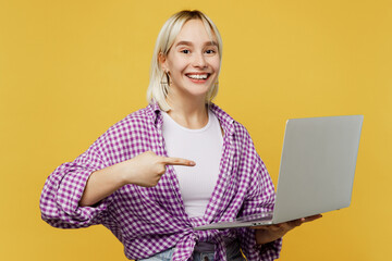 young blonde it woman 20s she wear pink tied shirt white t-shirt hold use work point index finger on