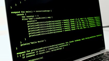 Wall Mural - developer is browsing html code on the computer screen. scroll of html web page code. programming co