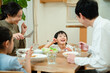© amanaimages - 夕飯を食べる子供