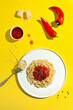 © ADDICTIVE STOCK - Tasty spaghetti on plate with spicy sauce decorated on table