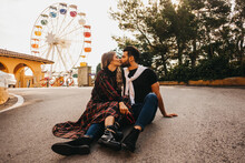 couple dating in a funfair