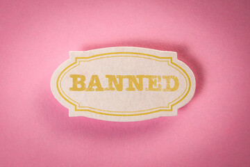 Canvas Print - BANNED. Note sticker with text on pink background