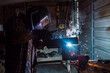 © ADDICTIVE STOCK - Workman heating detail with gas torch