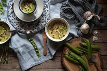 Composition Of Soup Bowls And Pea Pods