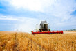 © 279photo - Grain combine harvesters working in wheat field. Agriculture background. Harvest season