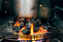 Burning Coal On Grill