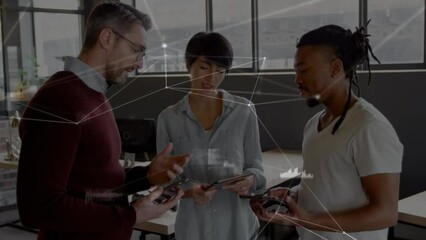 Canvas Print - Animation of network of connections over diverse office colleagues discussing at office