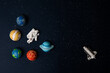 astronaut and planets on space background