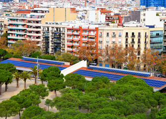 Wall Mural - Solar panels in Barcelona. Solar panels. Solar energy from solar panels. Facade buildings. Sun battery. Photovoltaic, alternative source of electricity. alternative green energy. Ecology on city.