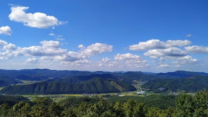 Fototapete - hiking. mountains in korea. view of mountain peaks and blue sky.