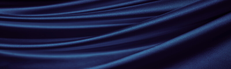 Wall Mural - Black blue silk satin. Dark elegant background with space. Wavy folds. Shiny fabric. Luxurious. Valentine, 14.02, Christmas, New year, festive. Banner. Long. Wide. Panoramic. Website header. Design.