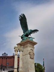 Vertical shot of the Turul bird historic statue on the Royal Castle, Budapest, Hungary