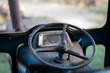 Tractor stirring wheel on the farm