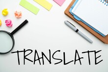 TRANSLATE Text On White Background With Office And School Supplies