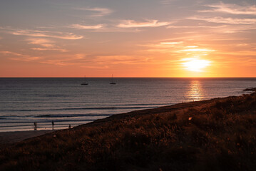 sunset over the sea beach meadow cliff dunes bowat