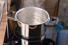 Boiling Water In A Pan On A Hot Electric Stove.