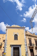 Wall Mural - A small church with yellow walls in Partinico