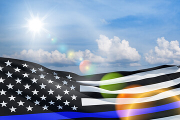 Wall Mural - American flag with police support symbol Thin blue line on blue sky. American police in society as the force which holds back chaos, allowing order and civilization to thrive. 3d-rendering.