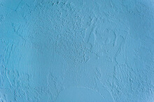 Background, Texture Of Uneven Surface In Blue Wall Paint.