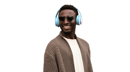 Wall Mural - Portrait of happy smiling african man in wireless headphones listening to music looking away isolated on white background